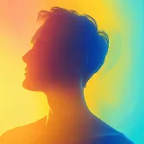 Silhouette of a person's side profile with colorful blue, orange, and yellow lighting background.