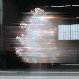 Blurred white Christmas tree with horizontal light streaks in a dimly lit room with window shadows.