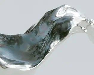 Close-up of a smooth, reflective silver liquid splash against a light gray background.